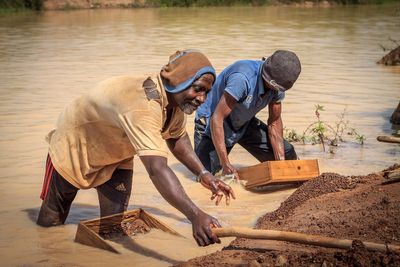 Artisanal miners panning for diamonds. A practice some consider to produce sustainable diamonds.
