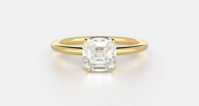 A royal Asscher cut set in 18K yellow gold