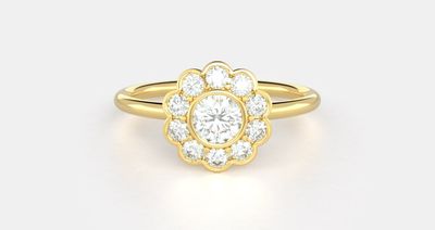 A cluster diamond ring in yellow gold. An engagement ring under $1000.