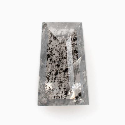 A slat and pepper tapered baguette diamond
