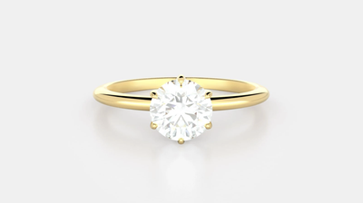 Harper No. 1. A round diamond solitaire in yellow gold.