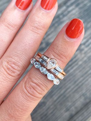 Parker No. 9 customized three stone engagement ring with tapered baguette side stones