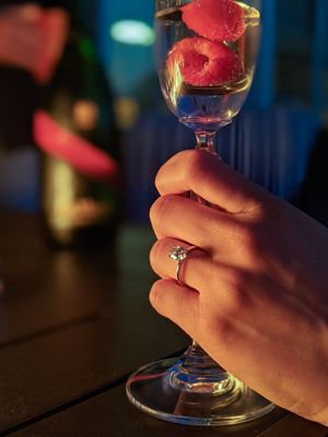 hand wearing diamond ring — image of restaurant proposal idea