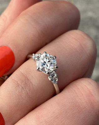 frank darling custom five stone ring with baguette sidestones and bullets