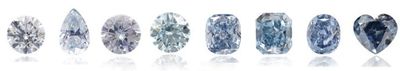 variety of blue diamonds in varying shapes and hues for a blue diamond engagement ring