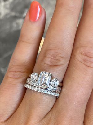 Frank Darling three stone Emerald cut art deco style engagement ring in white gold.
