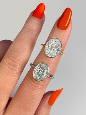 Custom Frank Darling 8 carat diamond ring stacked with a 4 carat diamond ring