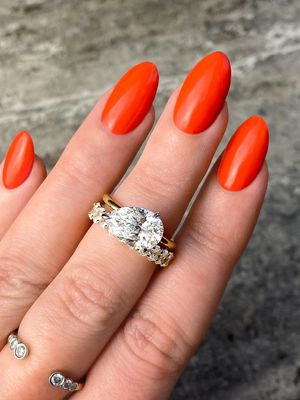 Custom Frank Darling Harper pear cut diamond solitaire engagement ring in platinum