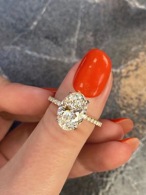 Custom Frank Darling Oval engagement ring with pavé band.