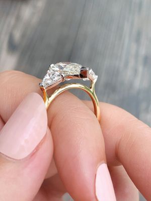 Custom Frank Darling trillion side stone ring