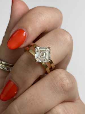 Frank darling custom kite set square diamond ring.