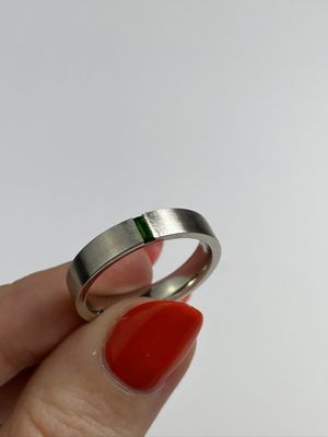 Frank Darling custom Men's wedding band with emerald accent