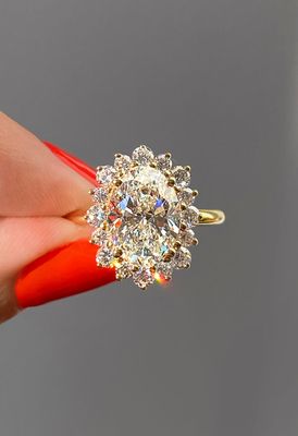 Frank Darling custom sunburst oval engagement ring