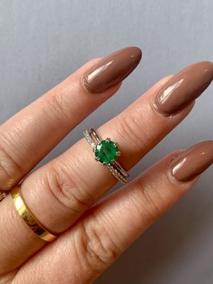 Frank Darling low set emerald gemstone engagement ring