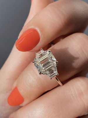 Frank Darling emerald cut three stone with trapezoids