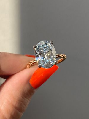 Frank Darling oval blue diamond ring