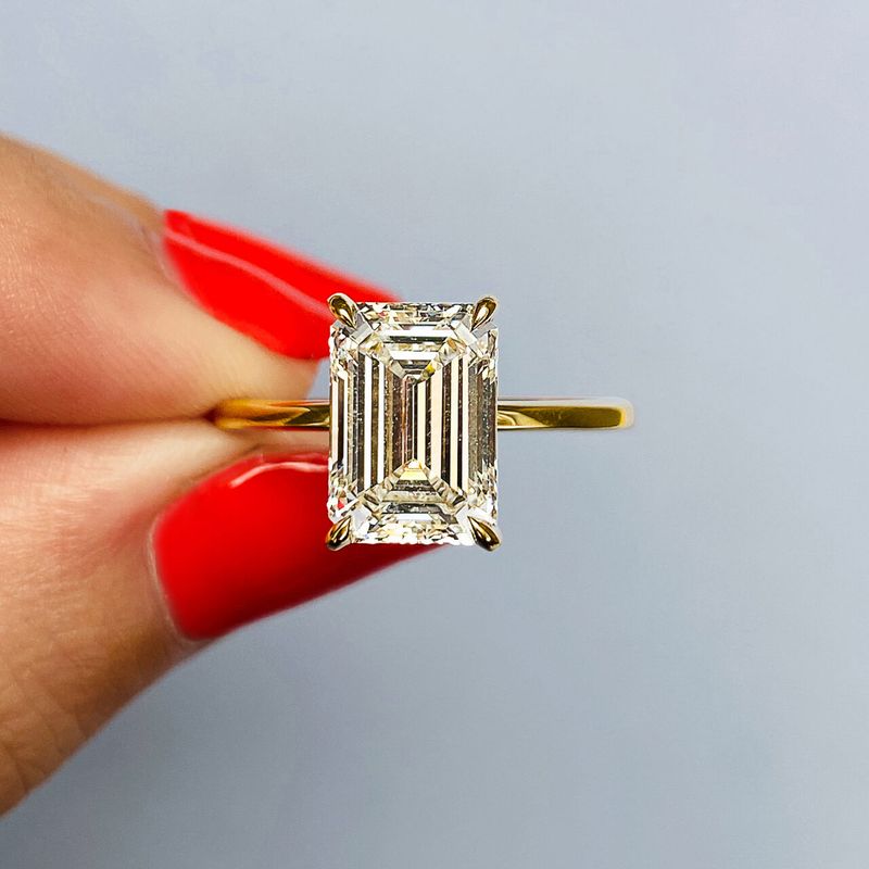 emerald cut emerald with diamonds